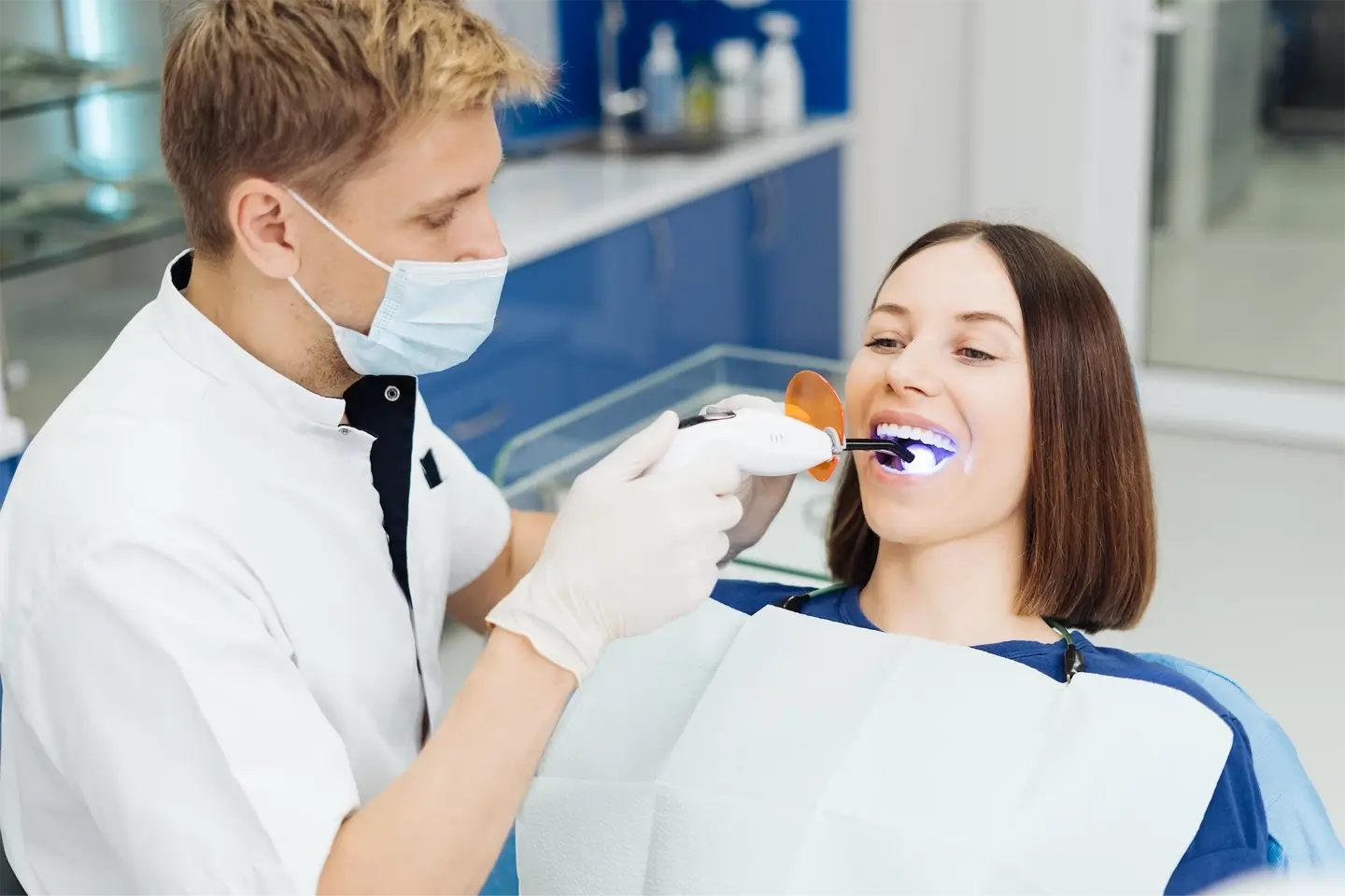 Whitening Teeth Procedure During Visit At Dentist